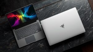 Premium Razer Book 14 2026 professional laptop with vacuum vapor chamber cooling and Mercury White CNC aluminum chassis.
